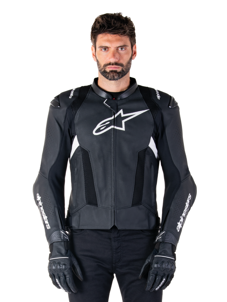 Alpinestars Missile V3 Airflow Leather Jacket, Black and White, motorcycle racing jacket with perforated leather ventilation panels, large white star logo on chest, worn with matching gloves, sporty protective design