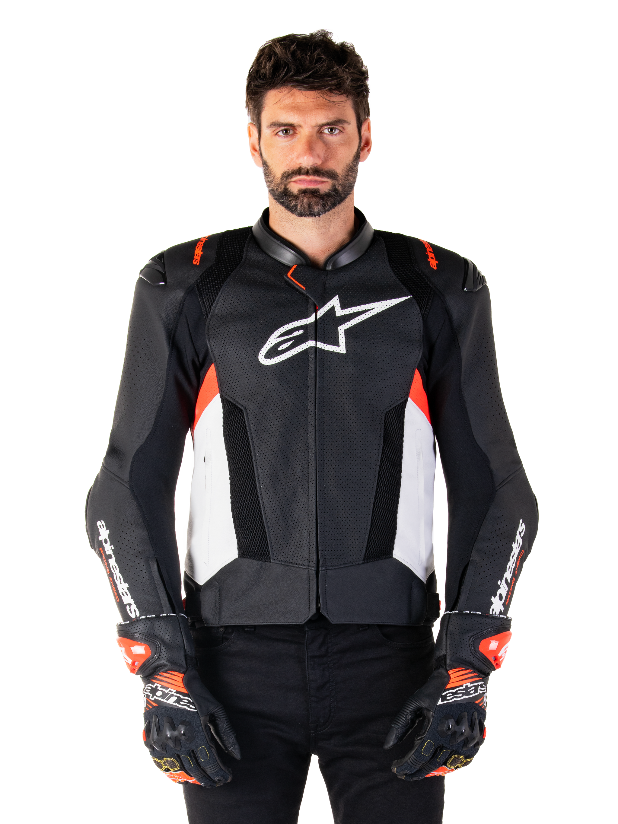Alpinestars Missile V3 Airflow Leather Jacket, Motorcycle Racing Jacket, Black and White with Red Fluo accents, perforated ventilation panels, white star logo on chest, worn with black and red gloves, premium leather construction