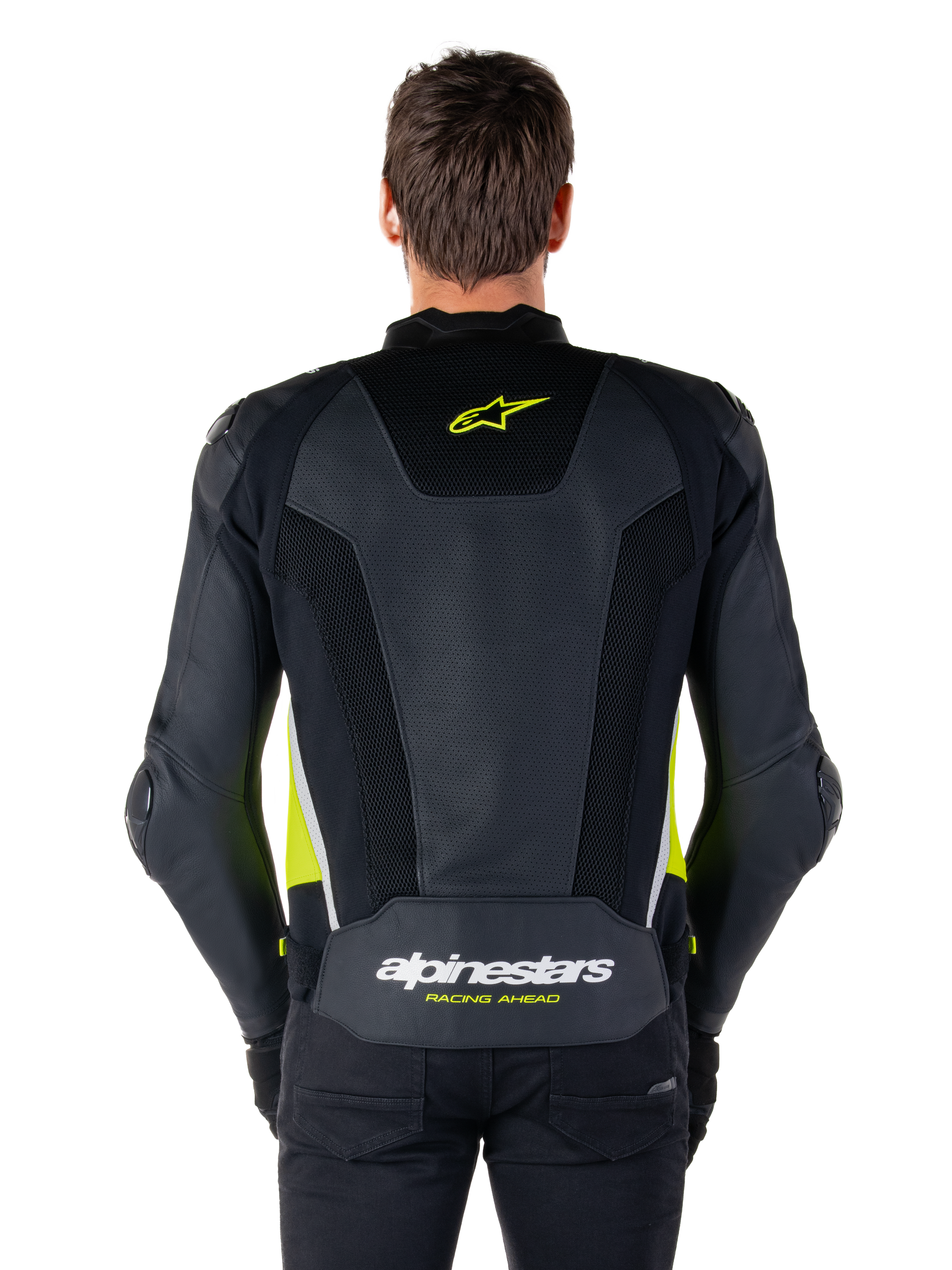 Alpinestars Missile V3 Airflow Leather Jacket, back view, black with fluo yellow and white accents, extensive perforated leather panels for cooling, Alpinestars branding on the upper and lower back, racing-inspired motorcycle sport jacket