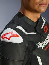 Alpinestars GP Force V2 Leather Jacket, Black and White, close-up of GP Lite Evo DFS shoulder protector with red Alpinestars logo, premium bovine leather multi-panel construction, integrated stretch panels for performance riding