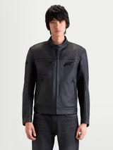 Alpinestars Maver-X Leather Jacket, men's urban contemporary motorcycle leather jacket in black, front view on a model wearing protective riding gear, premium bovine leather construction with stretch inserts