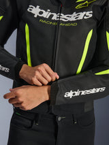 Alpinestars GP Force V2 Air Leather Jacket, Black Yellow Fluo, close-up of perforated leather construction and high-visibility accents, featuring prominent branding and 'RACING AHEAD' graphic, sporty design for motorcycle performance