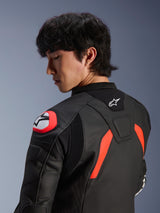 Alpinestars GP Plus R V4 Airflow Leather Jacket, Black with Red Fluo and White accents, close-up view of the back and shoulder on a model, featuring perforated leather zones, Alpinestars logo, and integrated shoulder armor for motorcycle performance.