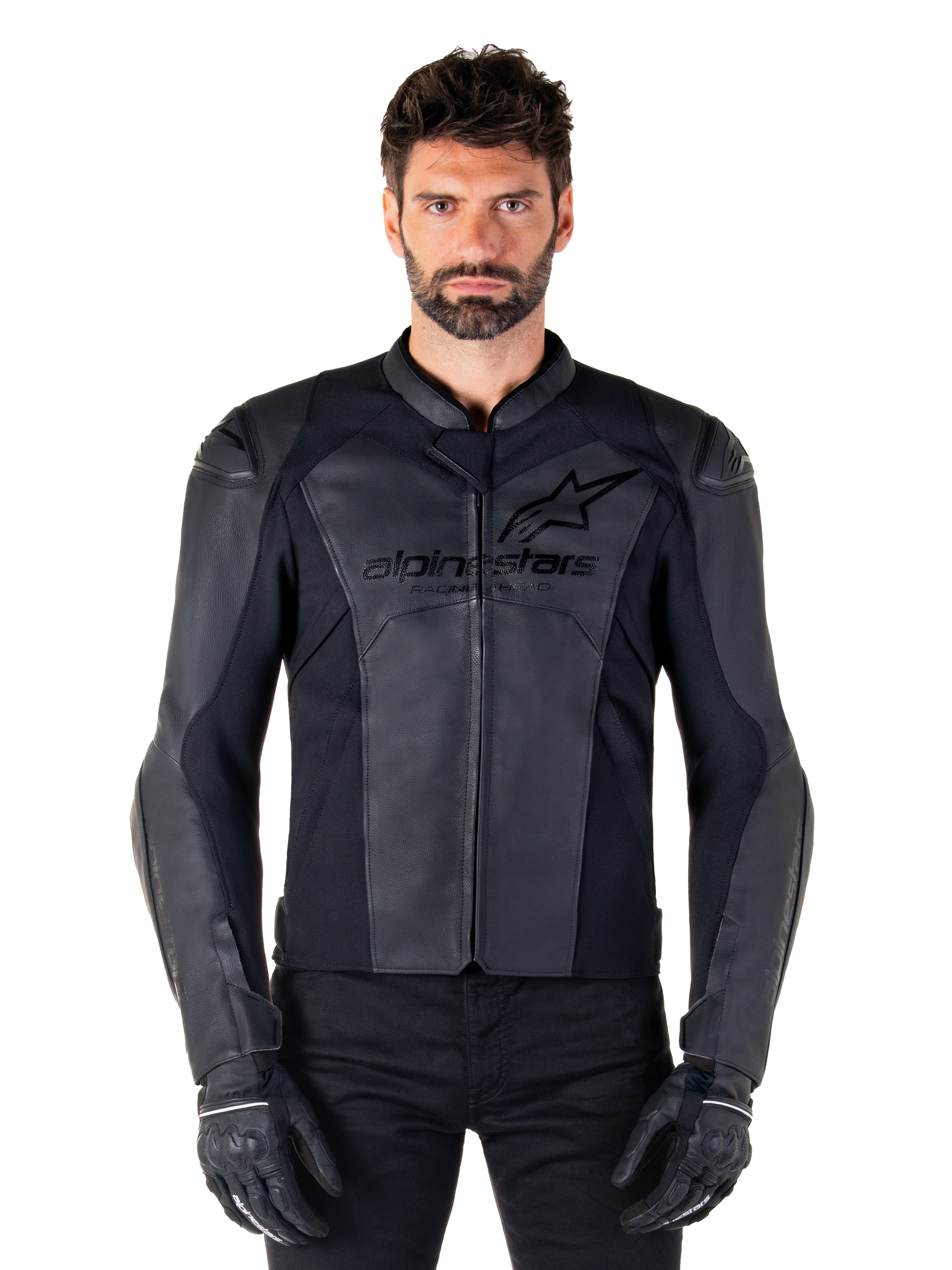 Alpinestars Faster V3 Leather Jacket, Black Motorcycle Jacket, premium leather with HRSF stretch panels, sleek sport fit, reinforced shoulders with protectors, worn with black gloves, professional gear for road riding