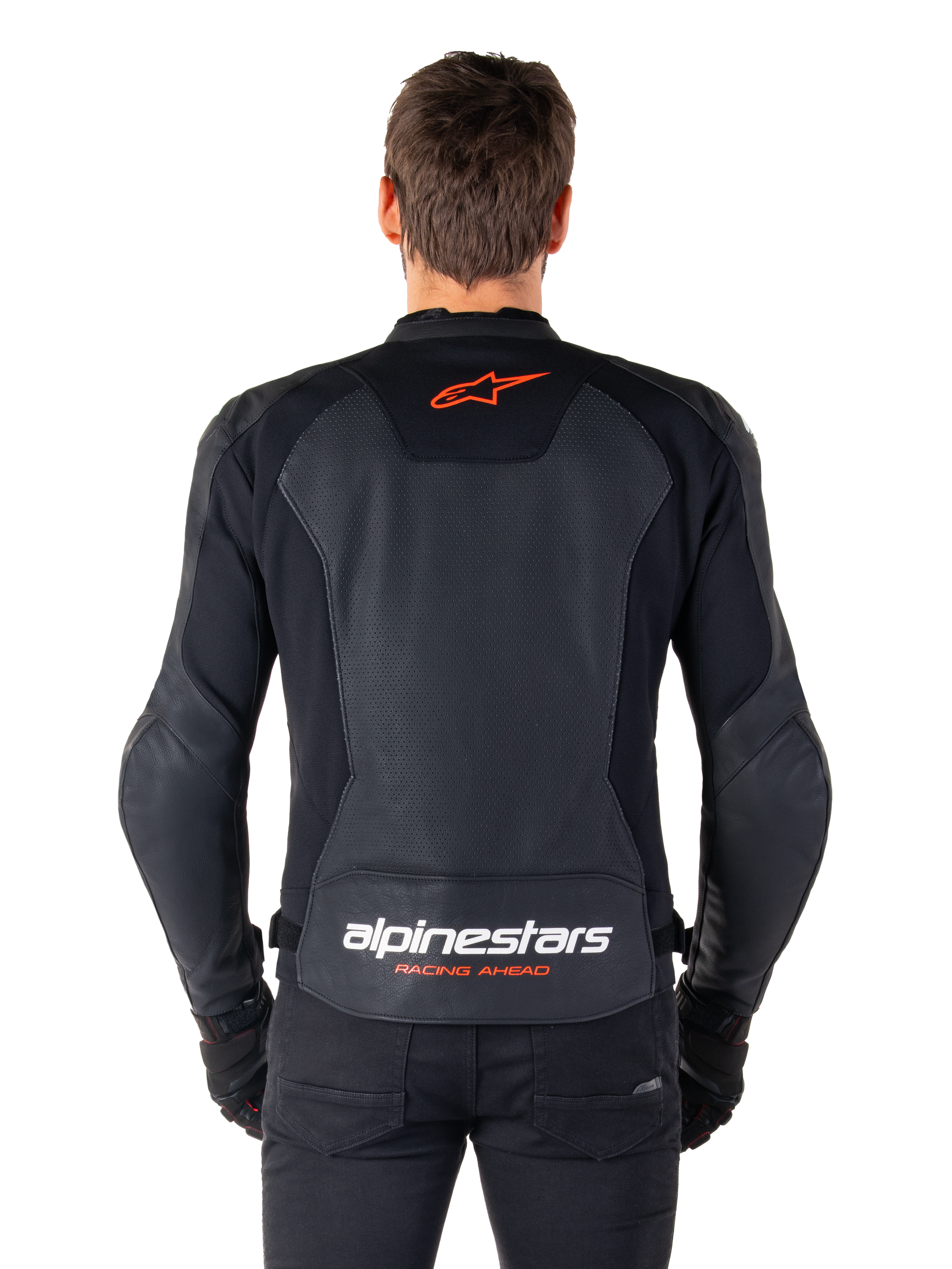 Alpinestars Faster V3 Airflow Leather Jacket, Black, rear view featuring perforated leather panels for ventilation, red Alpinestars star logo, and white branding on the lower back, worn with black pants and gloves.