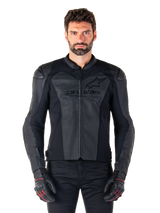Man wearing Alpinestars Faster V3 Airflow Leather Jacket, Black motorcycle racing jacket with perforated leather panels, featuring Alpinestars logo on the chest, paired with black riding gloves, front-facing studio shot.