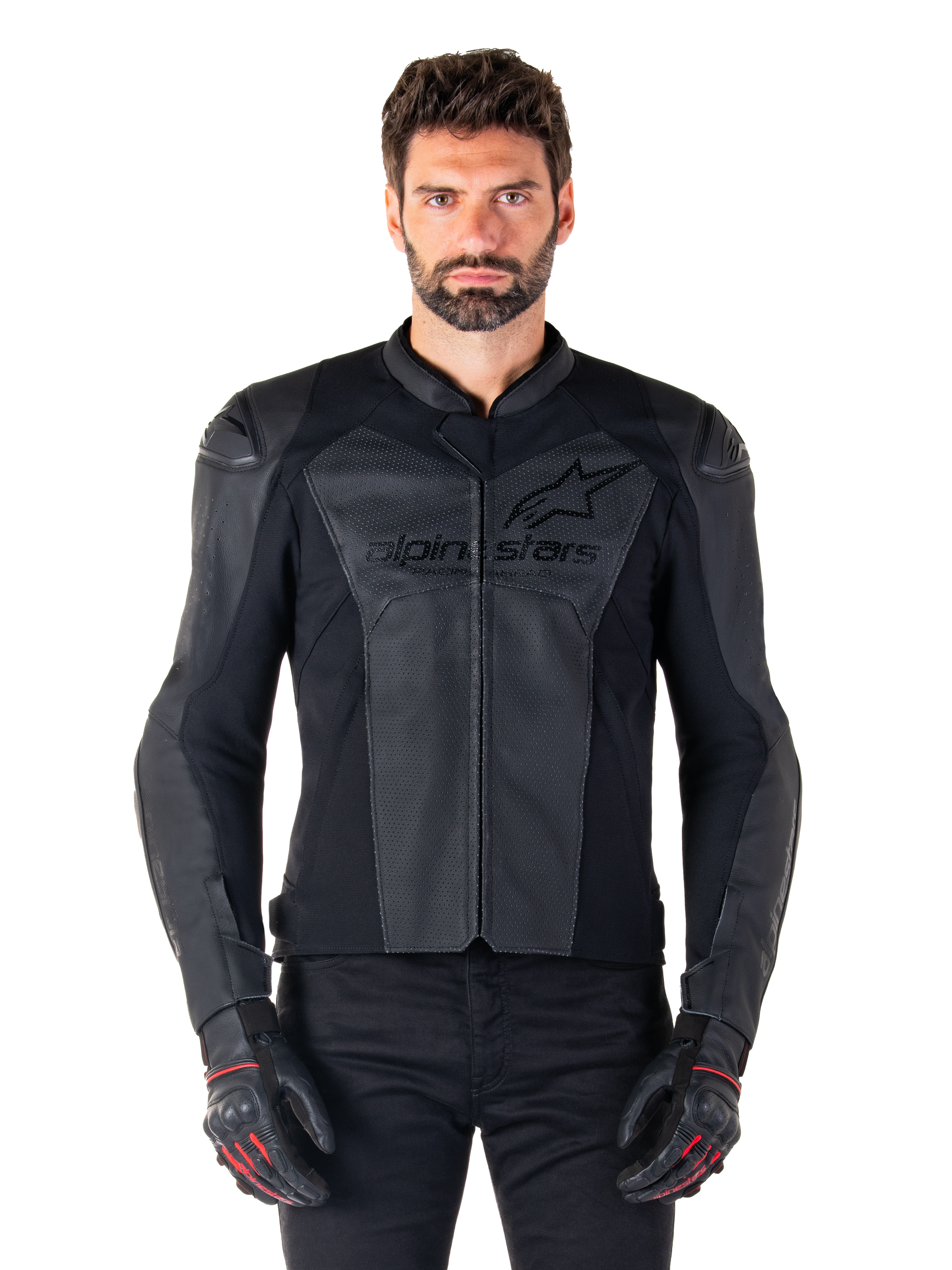 Man wearing Alpinestars Faster V3 Airflow Leather Jacket, Black motorcycle racing jacket with perforated leather panels, featuring Alpinestars logo on the chest, paired with black riding gloves, front-facing studio shot.
