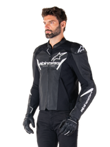 Alpinestars Faster V3 Airflow Leather Jacket, Black and White, sport motorcycle jacket with perforated leather panels, white Alpinestars branding on chest and arms, worn by a model with black gloves and pants, sleek and protective riding gear