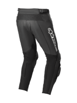 Alpinestars Track V2 Leather Pants, Black, rear view showing accordion leather stretch zones, white Alpinestars branding on the thigh, large stretch panels on calves, and integrated knee sliders for track and street use