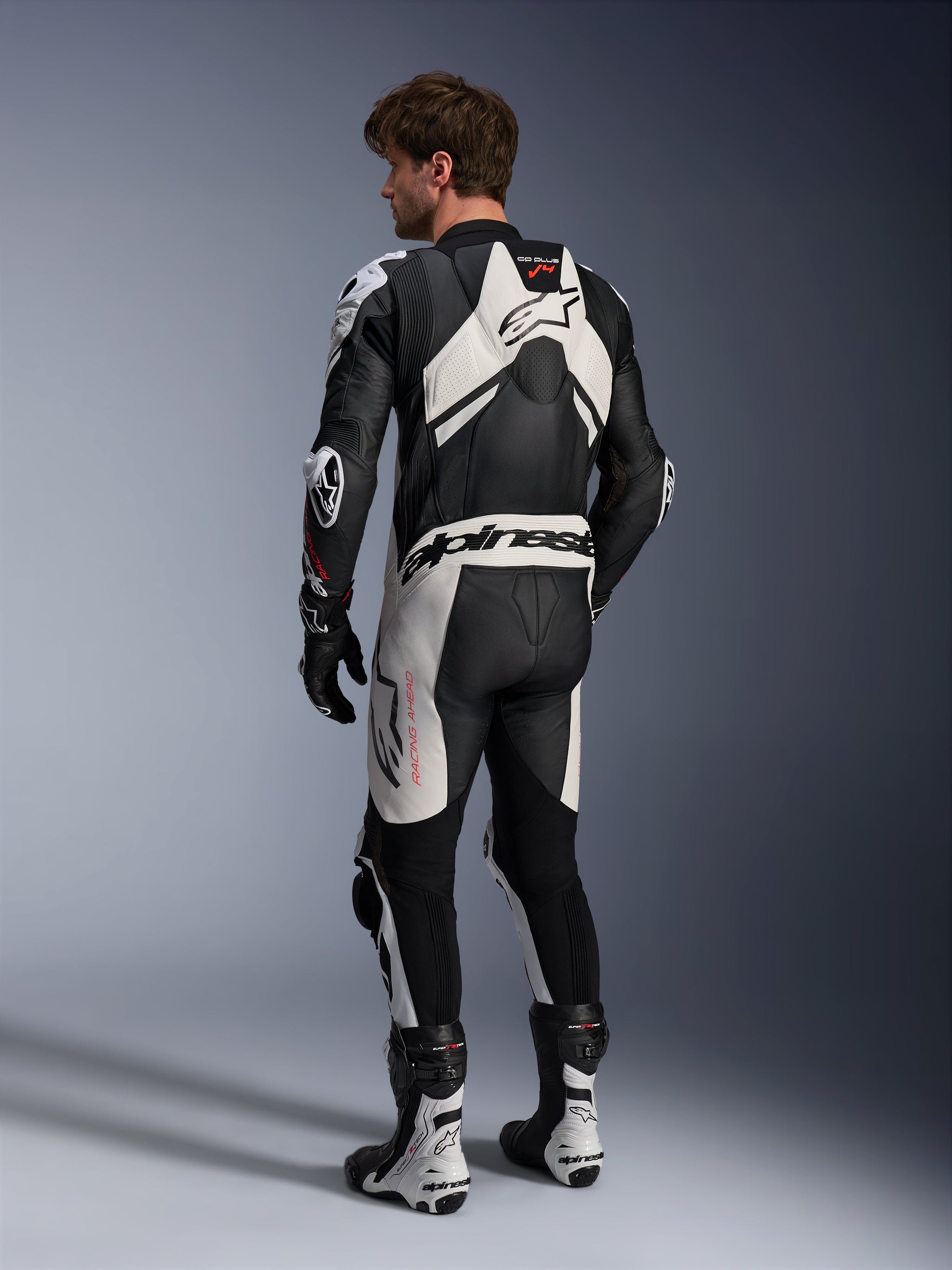 Alpinestars GP Plus V4 Sprint 1PC Leather Suit, Black and White, rear view with racing aero hump, men's motorcycle gear.