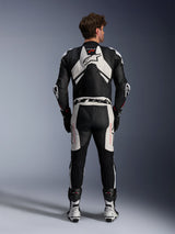 Alpinestars GP Plus V4 Sprint 1 Piece Leather Suit, Men's Racing Gear in Black and White with Red Fluo and aerodynamic hump.