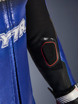 Close-up detail of the Yamaha GP-R7 One Piece Leather Suit forearm, featuring the integrated Tech-Air 10 Bluetooth display pocket with red trim, metallic blue perforated leather, and black stretch fabric inserts for racing performance.