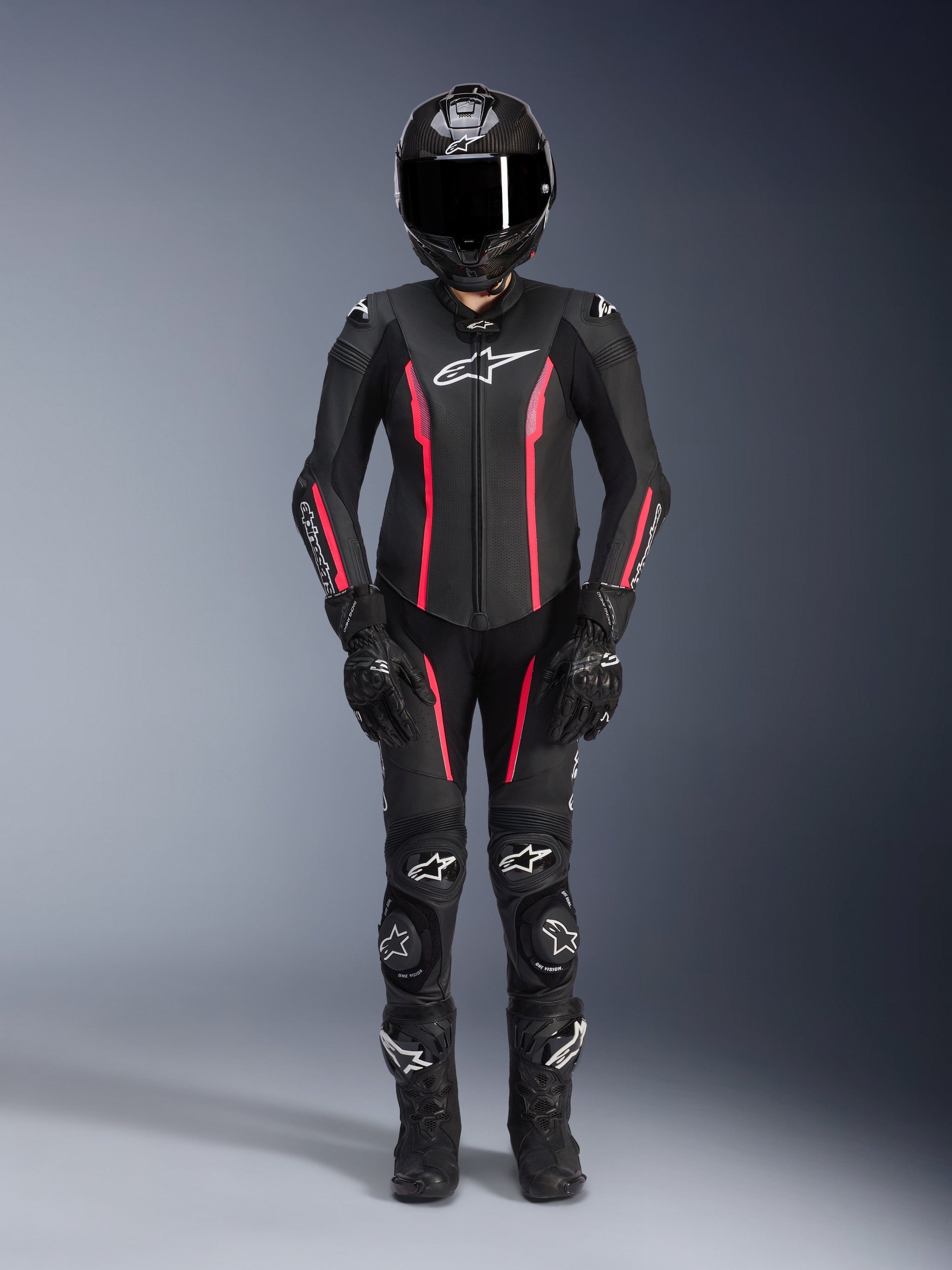 Alpinestars Stella Missile V2 1-Piece Suit, Women's Motorcycle Racing Suit, Black and Red, full protective gear with helmet, gloves, and boots, sleek aerodynamic design