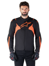 Alpinestars T-Jaws V4 Waterproof Jacket, Motorcycle Sport Jacket, Black and Red Fluo, featuring neon accents and a prominent star logo on the chest, worn by a male model with black riding gloves, sleek racing-inspired textile design