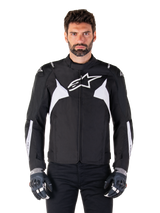 Alpinestars T-Jaws V4 Waterproof Jacket, Black and White, men's sport textile motorcycle jacket, featuring a white star logo on the chest, white shoulder accents, and white forearm stripes, high collar, athletic fit for road riding
