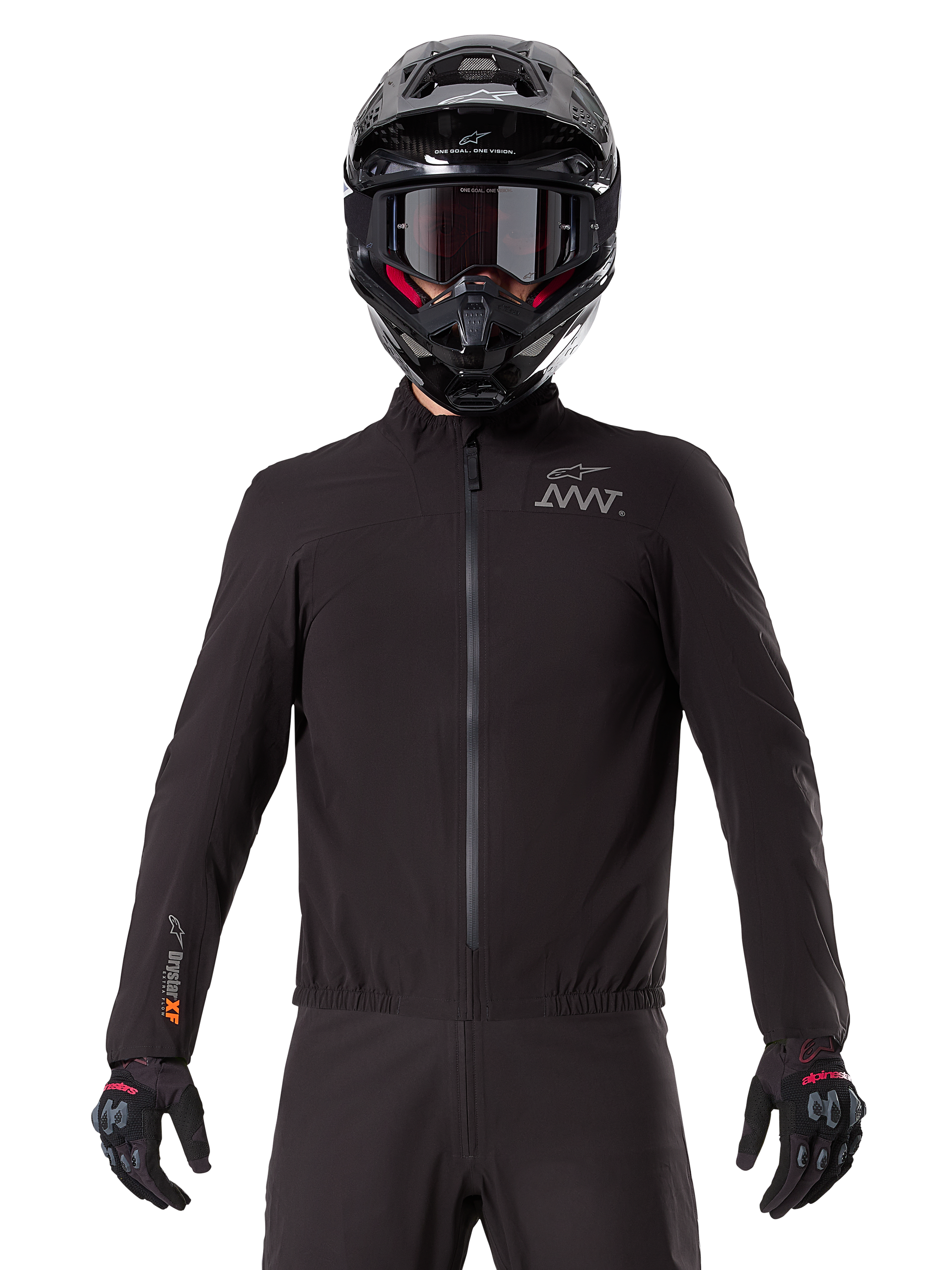 Alpinestars AMT-8 Stretch Drystar® XF Liner, black waterproof motorcycle liner, featuring a front zipper and elasticated waist, AMT logo on the chest and Drystar XF branding on the sleeve, worn with a black helmet and gloves.