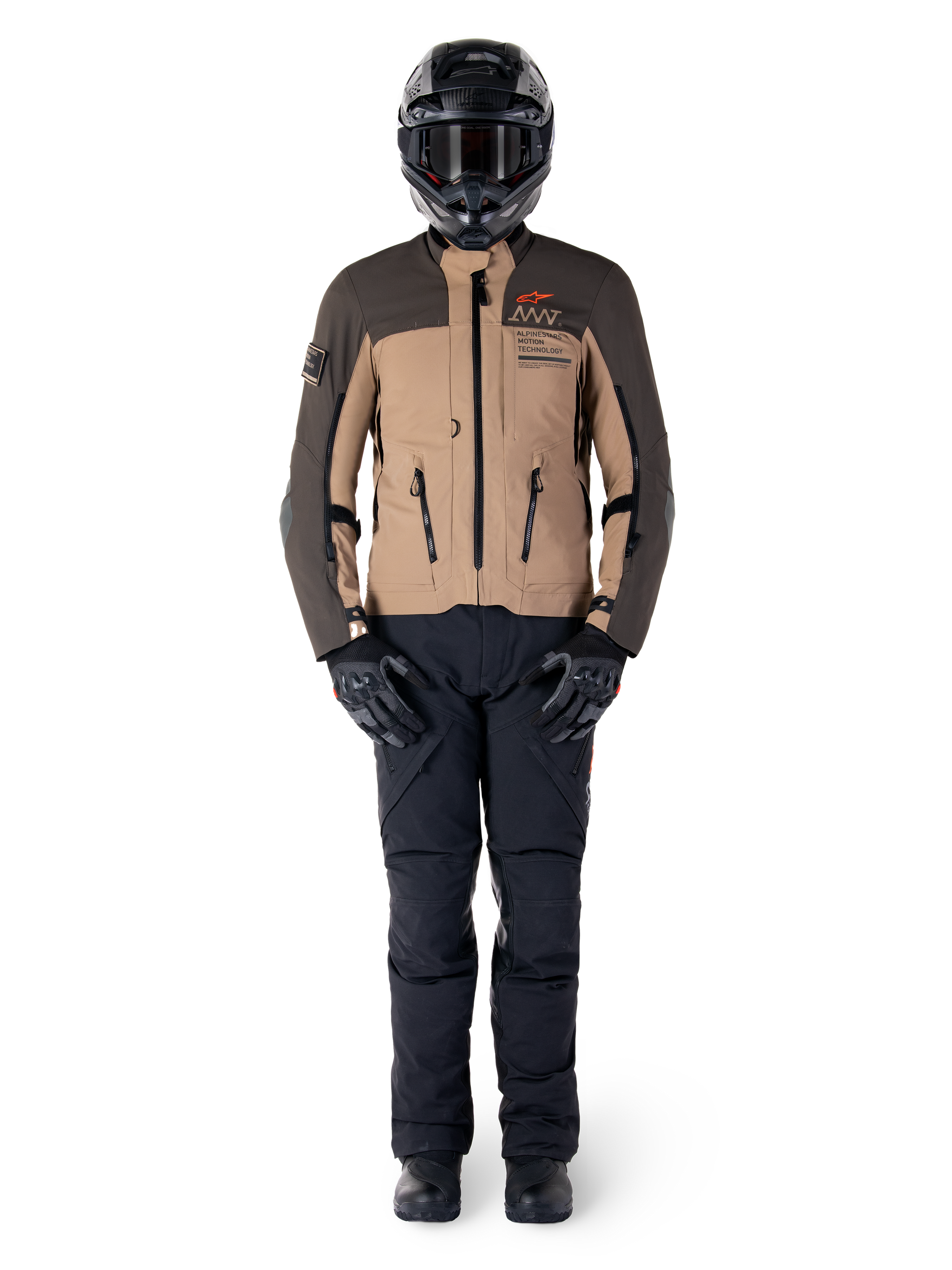 Alpinestars AMT-8 Stretch Drystar® XF Jacket, Adventure Motorcycle Jacket, Dark Brown and Dark Khaki, worn with a black helmet, goggles, black gloves, black pants, and black boots, featuring chest ventilation ports and AMT branding, coordinated gear for adventure touring