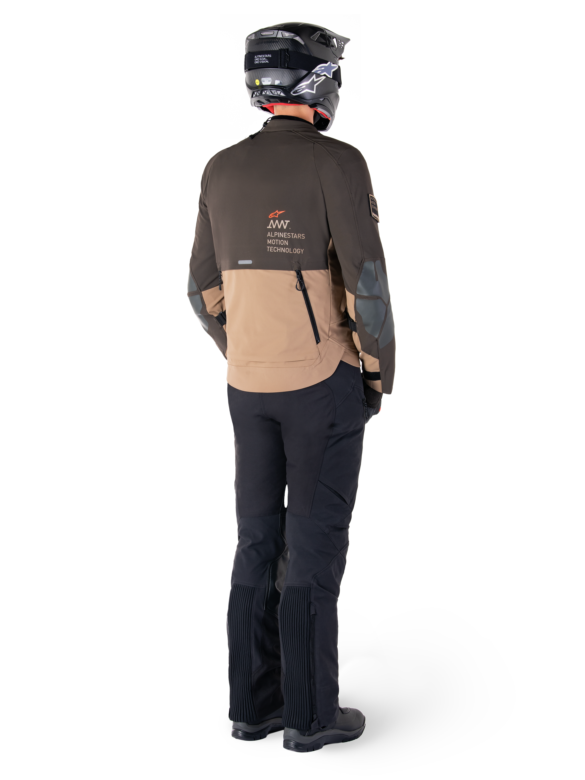 Alpinestars AMT-8 Stretch Drystar® XF Jacket, Adventure Touring Motorcycle Jacket, Dark Brown and Dark Khaki, rear view showing 'AMT Alpinestars Motion Technology' branding, worn with black pants and helmet, ergonomic stretch design for adventure riding