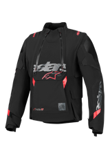 Alpinestars Halo Pro Drystar® XF Laminated Jacket, Black with red and grey accents, featuring dual asymmetrical waterproof front zippers, a large chest logo, and a modular technical textile design for adventure riding.