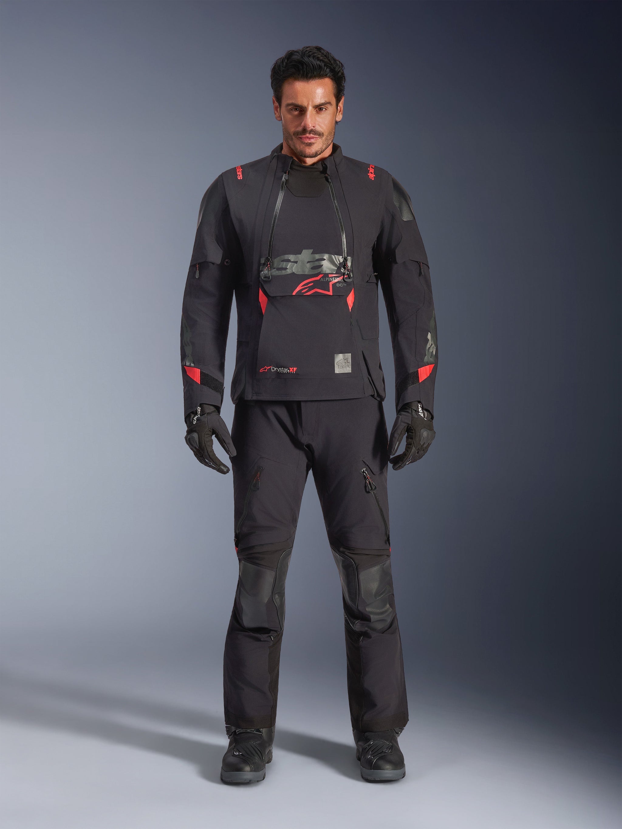Alpinestars Halo Pro Drystar® XF Laminated Jacket, Black Dark Shadow with red accents, adventure motorcycle gear set including matching pants and gloves, modular textile design with front ventilation panels and prominent chest logo.