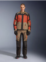 Alpinestars Andes V4 Drystar® Jacket, Adventure Motorcycle Jacket, Walnut Rust Black, worn with matching pants and gloves, multi-tonal design with rust orange and walnut brown panels, durable textile gear for all-terrain riding