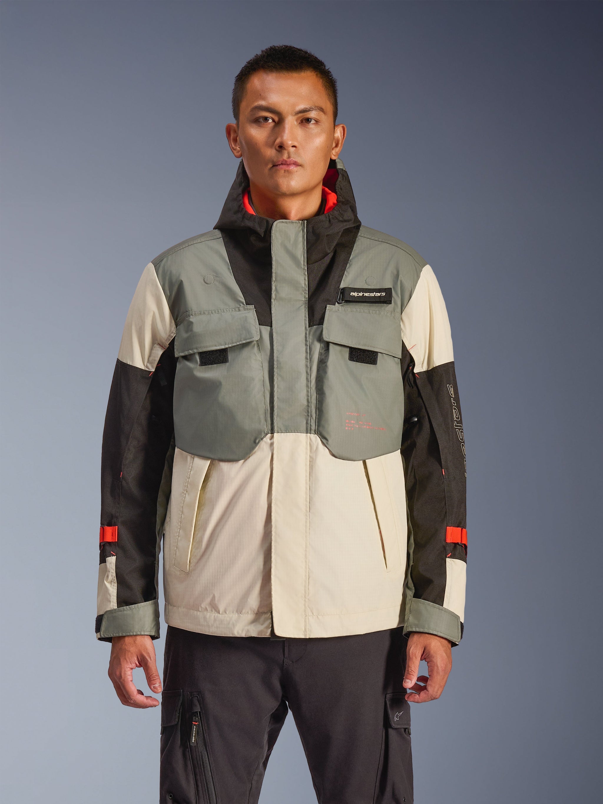 Alpinestars Mospher Waterproof Jacket, Men's Motorcycle Jacket, Fur Gray Black and Cream Colorblock, tactical-inspired design with chest pockets, high collar hood system, red accents on sleeves, urban commuter riding gear