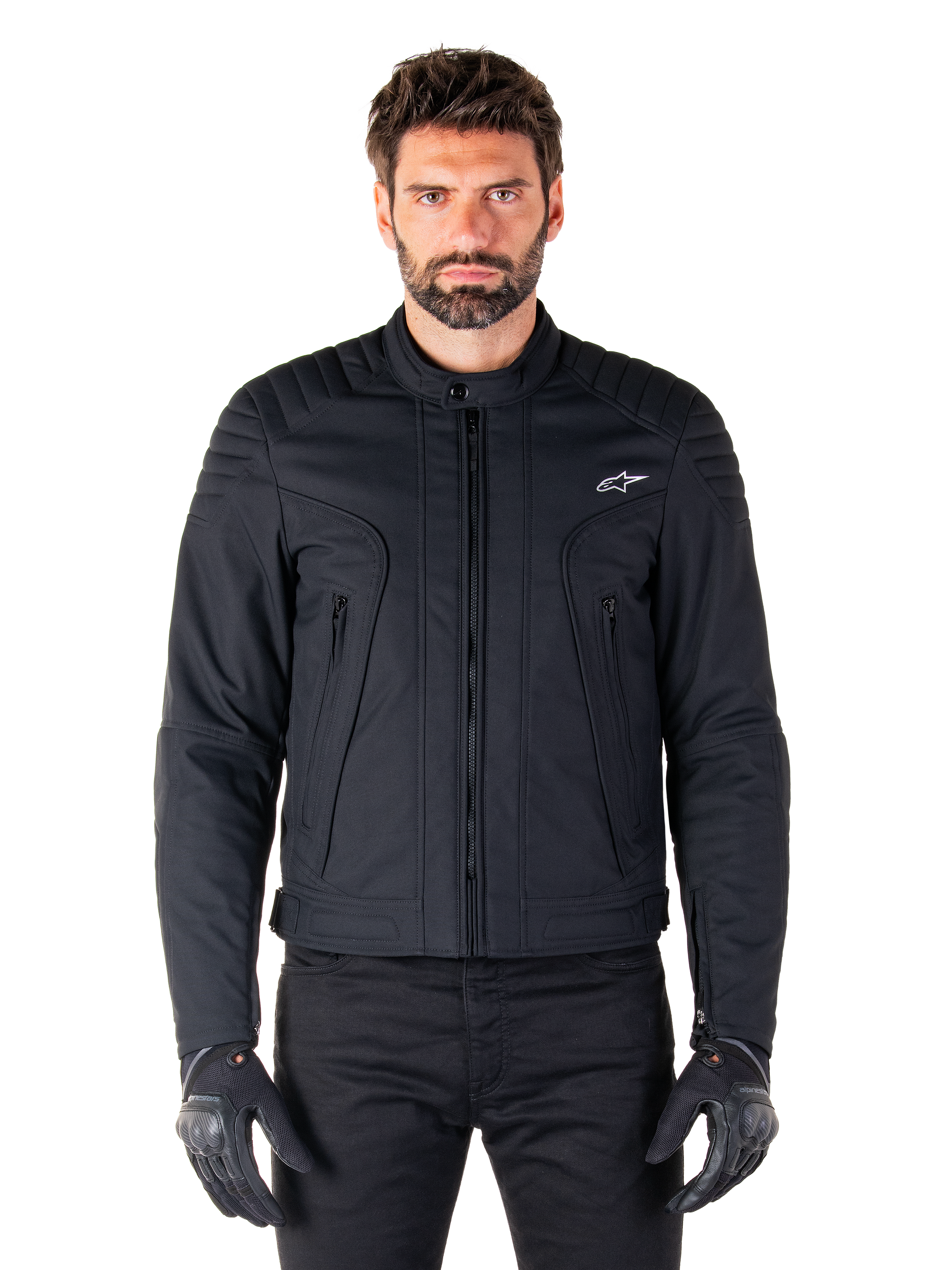 Alpinestars Clayton WR Jacket, Black Motorcycle Jacket, worn by model, featuring quilted shoulder details and technical graphics, central Vislon zipper, vertical zippered pockets, small white logo on chest, urban riding gear for road use