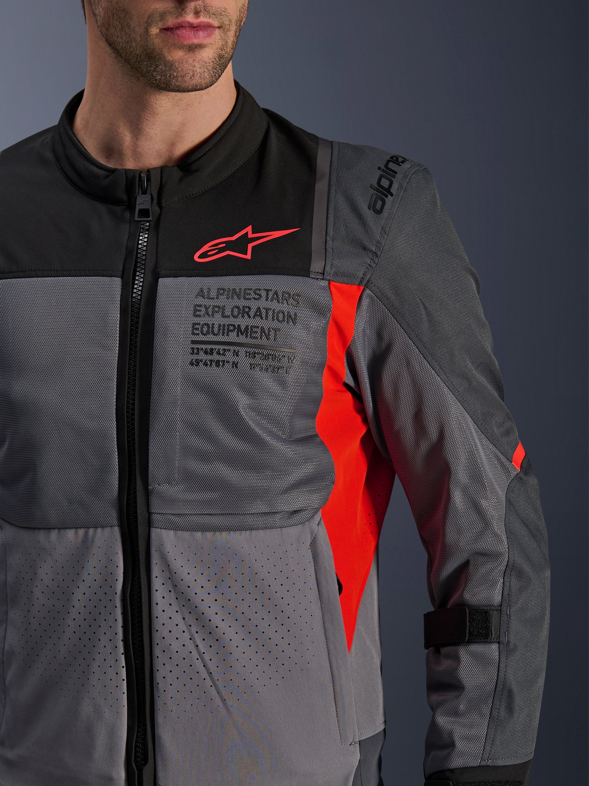Alpinestars ST-2 Air Jacket in Gray and Red, a men's textile motorcycle jacket with breathable mesh panels.