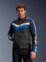 Alpinestars T-Dyno WR Jacket in Black Blue Ecru, textile motorcycle jacket featuring blue and off-white chevron stripes on the chest and sleeves, worn by a model.