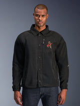 Alpinestars Revved WR Jacket, Black Motorcycle Jacket, featuring a shirt-style collar and snap-button front, red embroidered 'A' logo on chest, vertical zippered chest pocket, elastic cuffs, urban coaches jacket design