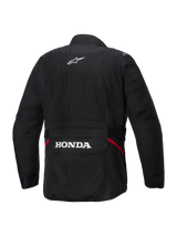 Alpinestars Honda ST-1 Waterproof Jacket, Back View, Black Textile, featuring white Alpinestars star logo on the upper back and Honda branding on the rear cargo pocket, red accents on the sides, durable touring motorcycle jacket