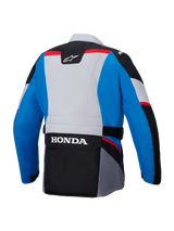 Alpinestars Honda ST-1 Waterproof Jacket, rear view, Blue and Light Gray with Black panels and Red accents, features large white HONDA branding on the lower back cargo pocket, adventure touring style textile jacket.
