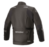 Alpinestars Andes V3 Drystar® Jacket, Motorcycle Jacket, Black, back view featuring a large lower utility pocket with Alpinestars branding, reflective accents on shoulders, and adjustable waist belt, durable textile design for adventure touring