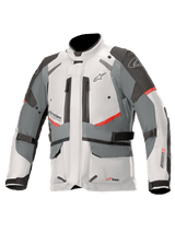 Alpinestars Andes V3 Drystar Jacket, adventure touring motorcycle jacket, ice gray and dark gray with red accents, waterproof textile construction with adjustment straps and zippered vents, high collar design for all-weather protection
