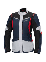 Alpinestars Stella ST-1 Waterproof Jacket, women's motorcycle touring jacket, Dark Blue, Black, and Bright Red, featuring light gray panels, high collar, front zipper, and adventure-inspired design with angular shapes and cargo pockets
