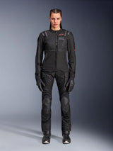 Alpinestars Stella ST-2 Air Jacket, Black, full-body studio view of a female rider wearing matching black motorcycle pants and gloves, featuring high-flow mesh panels, red logo details, and a modern touring design