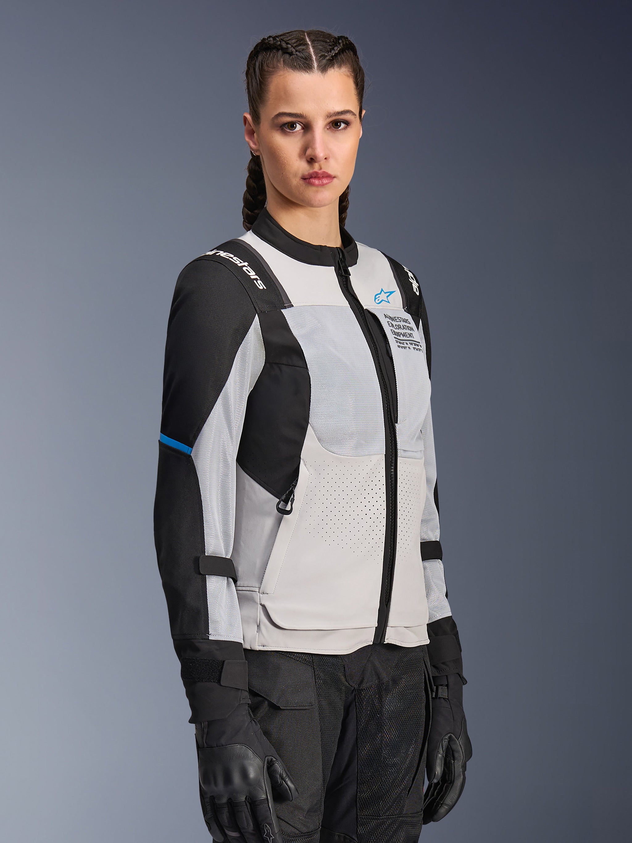 Alpinestars Stella ST-2 Air Jacket, Women's Motorcycle Jacket, Ice Gray and Black, Large mesh ventilation panels and laser-cut perforations, "Alpinestars Exploration Equipment" branding on chest, Technical summer riding gear