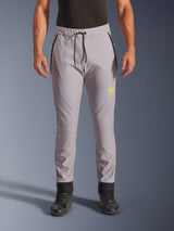 Alpinestars Aeroshell Pants, Mid Gray and Yellow Fluo, crossover softshell motorcycle pants, featuring a black drawstring waist and fitted ankle cuffs, yellow logo on left thigh, pre-curved knees, sporty jogger-style silhouette