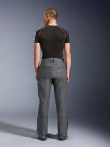 Alpinestars Borrego Drystar® Pants, Gray Adventure Motorcycle Pants, back view on a model, featuring a waxed-canvas appearance, side cargo pockets, and Alpinestars branding on the rear hip, styled with a black base layer