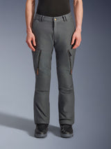 Alpinestars Borrego Drystar® Pants, Adventure Motorcycle Pants, Anthracite Gray, featuring vertical thigh zipper pockets with leather pull tabs, button waist closure, and belt loops, worn by a model with black motorcycle boots