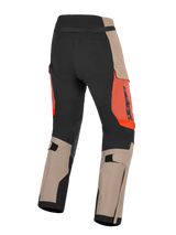 Alpinestars Halo Pro Drystar® XF Laminated Pants, Walnut Rust and Black, rear view of adventure motorcycle pants, featuring walnut tan and black panels with rust orange accents, adjustable calf straps, and durable construction for all-terrain riding.