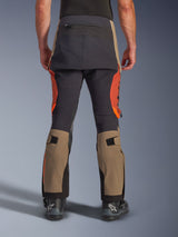 Alpinestars Halo Pro Drystar® XF Laminated Pants in Walnut Rust Black, rear view, adventure motorcycle pants featuring walnut tan and rust orange panels with black seat reinforcement, includes zippered back pocket and adjustable calf volume straps