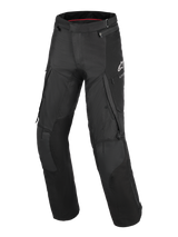 Alpinestars Andes V4 Drystar® Pants, Motorcycle Touring Pants, Black, featuring large cargo pockets, reinforced knee panels, white A-star logo on the hip, and durable textile construction for adventure riding
