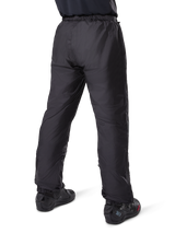 Alpinestars Bogota' Pro Drystar® 3 Seasons Pants, Black adventure touring motorcycle pants, rear view of the waterproof Drystar® liner worn as over-pants, paired with black motorcycle boots, technical lightweight construction for multi-season weather protection