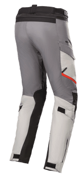 Alpinestars Andes V3 Drystar® Pants, Motorcycle Touring Pants, Ice Gray and Dark Gray, featuring black reinforcement panels and a red accent on the pocket, adjustable waist and calf straps, durable textile construction for adventure riding