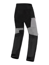 Alpinestars Stella Andes V4 Drystar® Pants, Women's Adventure Motorcycle Pants, Black and Dark Gray, rear view featuring gray panels on the back of the legs, durable ripstop reinforcements on the seat, and stretch zones for mobility in a waterproof textile design.