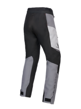 Alpinestars 2025 Honda Woman Stella ST-1 Waterproof Pants, Women's Motorcycle Touring Pants, Ice Gray Dark Gray and Black, rear three-quarter view showing durable textile construction, gray and black color-blocked panels, Honda branding on the hip, and adjustable ankle closures.