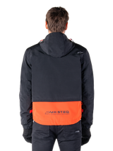 Alpinestars Mootant Waterproof Parka in Spicy Orange and Black, rear view showing black upper with hood and orange lower panel featuring the MO.ST.EQ. wordmark, functional motorcycle streetwear.