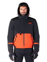 Alpinestars Mootant Waterproof Parka, Motorcycle Jacket, Spicy Orange and Black, modular all-weather design with hood, front zippered pockets, and orange strap details on sleeves, worn by a model with black gloves and pants