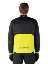 Alpinestars Mootant Waterproof Parka, Motorcycle Jacket, Lime Punch and Black, back view featuring black mesh upper for ventilation and lime lower section with MO.ST.EQ. logo, worn with black pants and gloves
